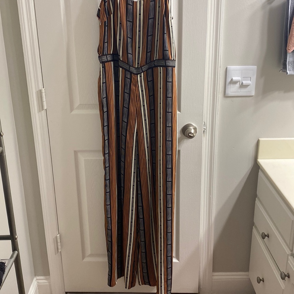 I am selling this brown, white and black jumper.
